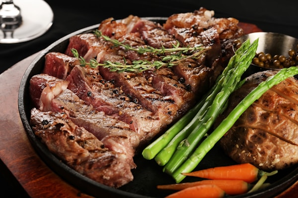 Caramelized burnt ends served on craft metal platter